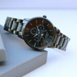 Men's Apollo Black Handwriting Engraving Watch with Moonphase Dial